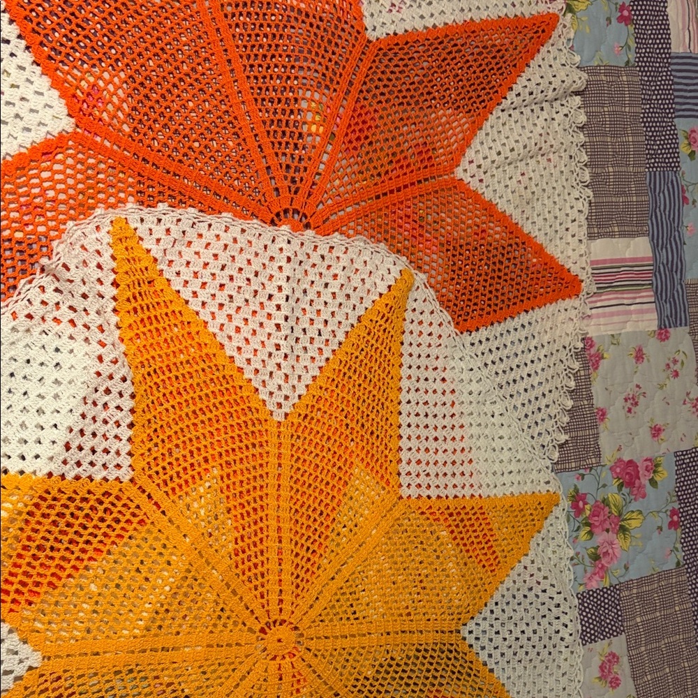 Vibrant Star Pattern Quilt in Orange and Yellow